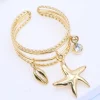 MIXED BRANDS - Ring three charms 233 - Gold Online